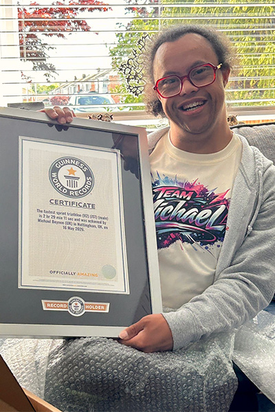 Michael holding his GWR certificate