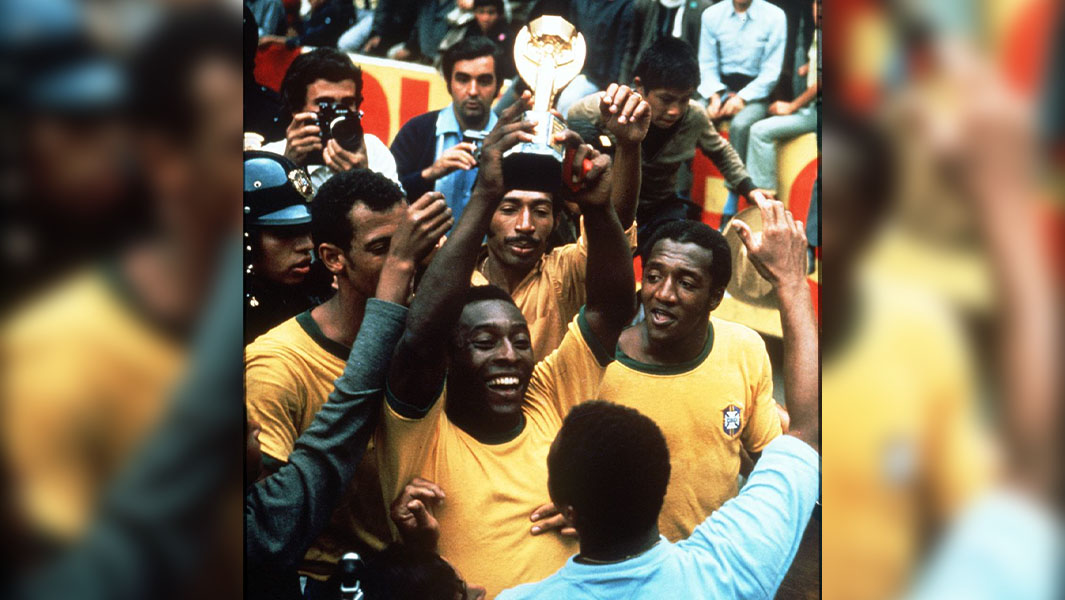 Pele lifts the Jules Rimet Trophy at the 1970 World Cup after Brazil defeated Italy 4-1