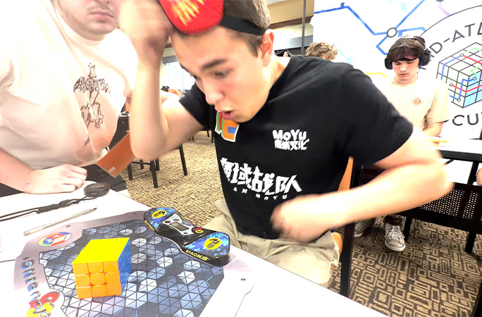 Tommy amazed as he looks at the timer