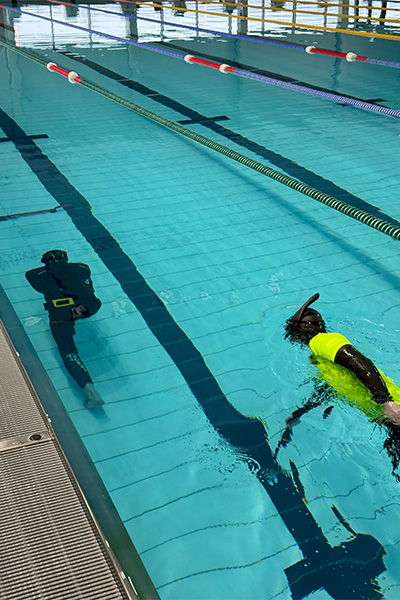 Stanislaw walking underneath the water