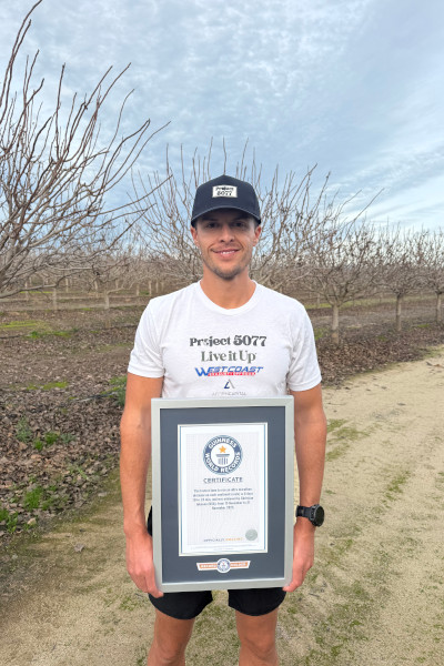 Christian holding his GWR certificate