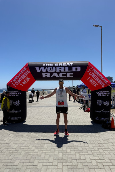 Christian posing under the race banner