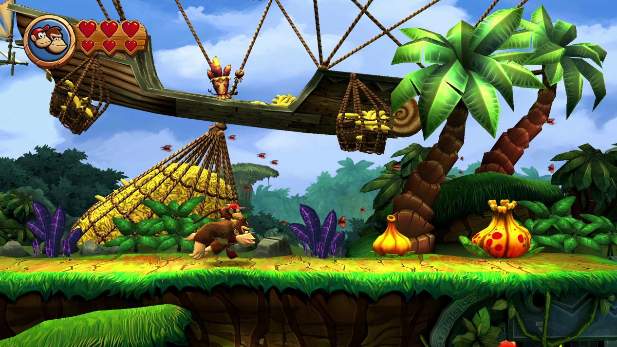Donkey Kong navigating a jungle level in the game Donkey Kong Country Returns HD