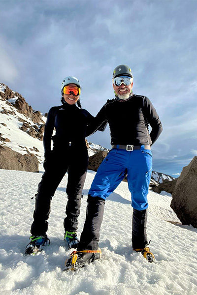 the couple on a snowy mountain