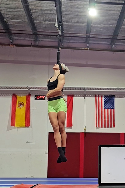Tiffany spinning while suspended by her neck