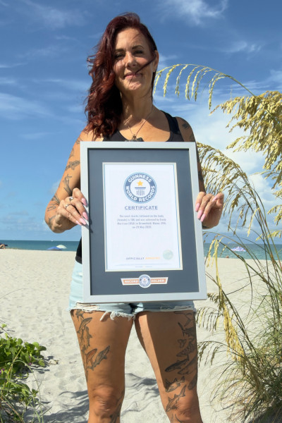 Emily holding her GWR certificate