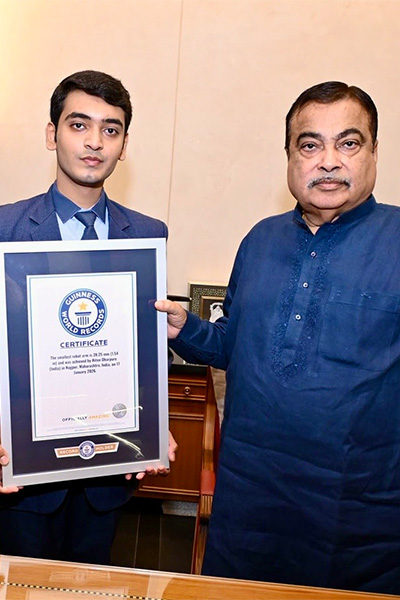 Hiten with his GWR certificate and a politician