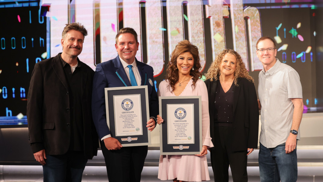 Adjudicator Michael, executive producers, and host of Big Brother with their GWR certificate