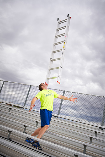 David balancing a ladder on his chin