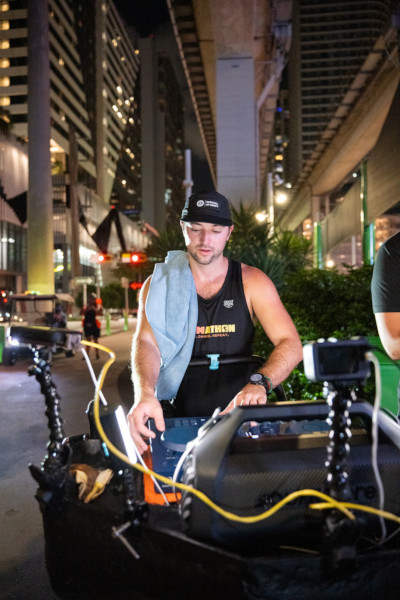 Eddy dj-ing on his rig at night