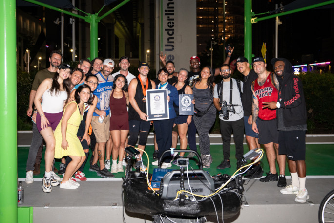 Group photo with all of Eddy's supporters holding the certificate after the attempt