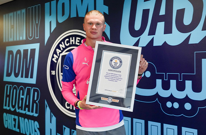 Erling with a certificate