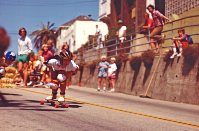 judi as a teenager going downhill in a skateboarding event