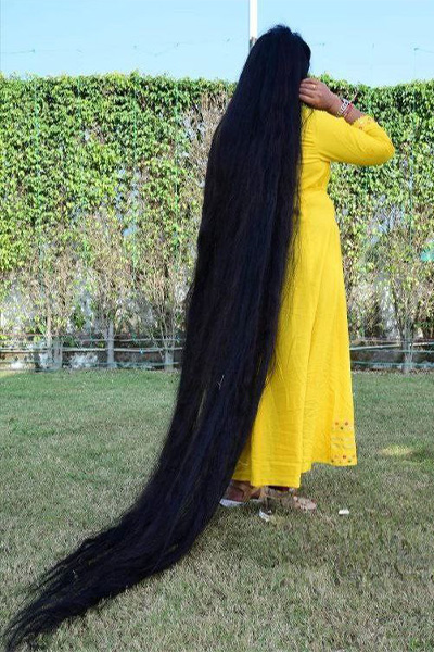 Renu with her hair trailing behind her