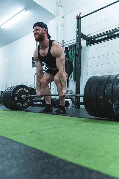 Daniel straining to lift