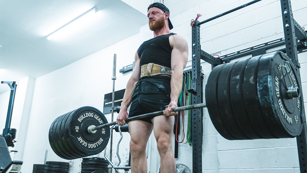 split image of Daniel performing a deadlift and lying on the floor exhausted