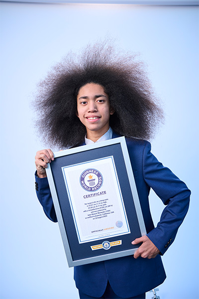 Amir holding a GWR certificate