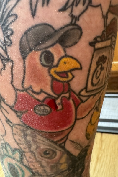 Closeup of Ashley's Chick-fil-A tattoo