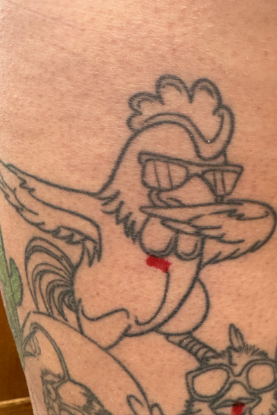 Ashley's dabbing chicken tattoo