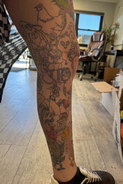 All of Ashley's chicken tattoos on her left leg