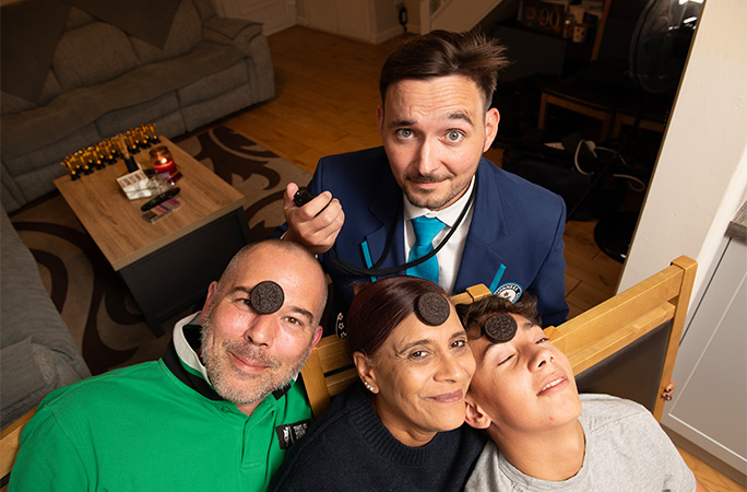 GWR Adjudicator Will Munford and a family of three with Oreo biscuits on their faces