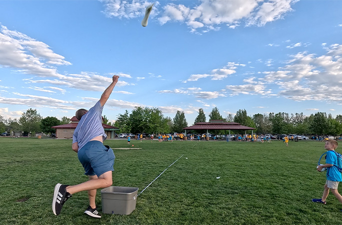 David letting go of the water balloon