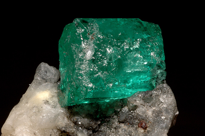 Colombian emerald on top of quartz