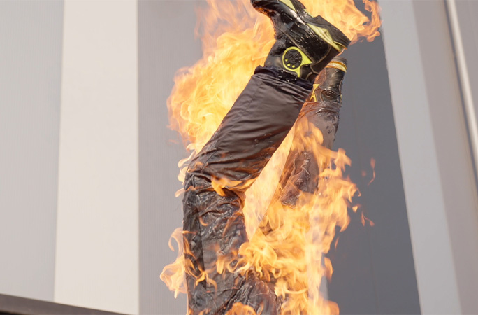 Filip's legs on fire in a handstand