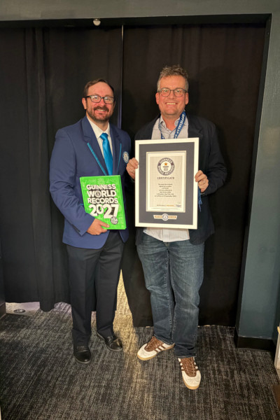 John Green and Adjudicator backstage, holding certificate and GWR2027