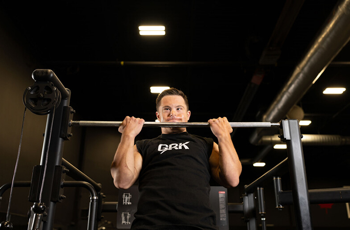 Kyle Landi lifting in the gym