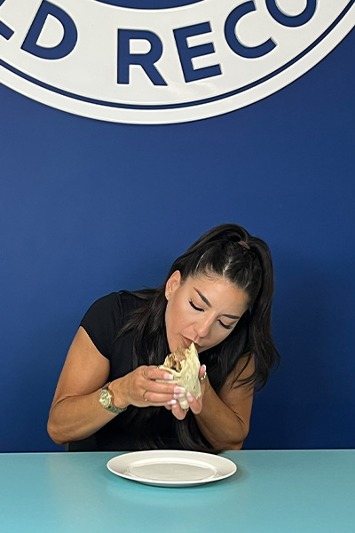 Leah eating a burrito