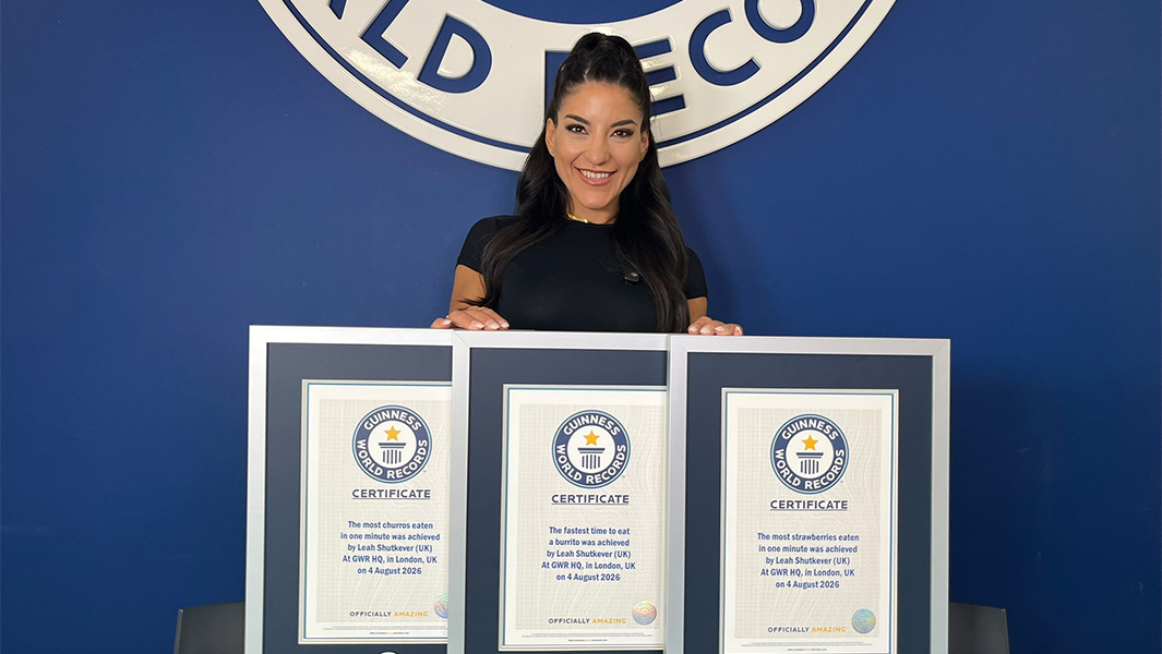Leah Shutkever with three Guinness World Records certificates