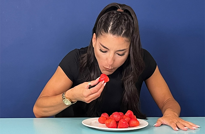 Leah eating strawberries