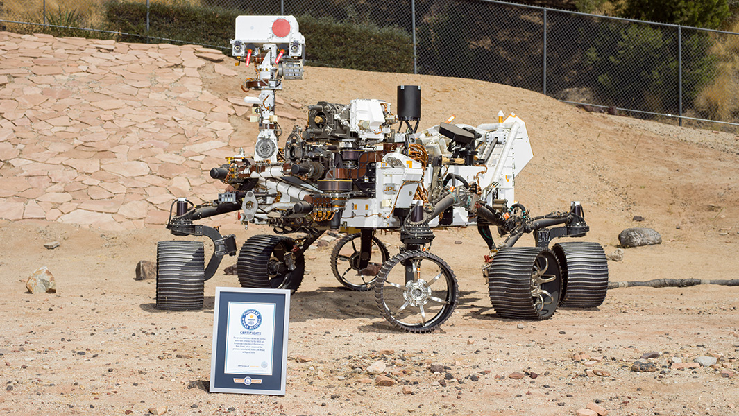 The twin of the Perseverance Rover poses with its GWR certificate