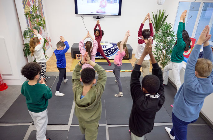 phoenix teaching yoga to kids