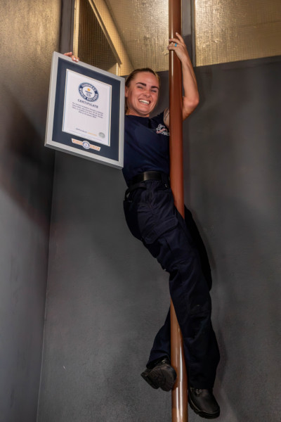 Autumn holding her GWR certificate and going down the fire pole