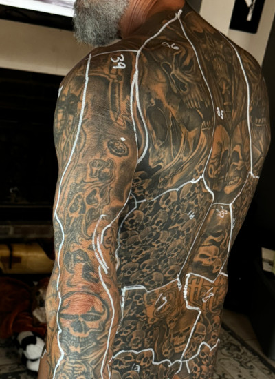 Full shot of Scott's back tattoos