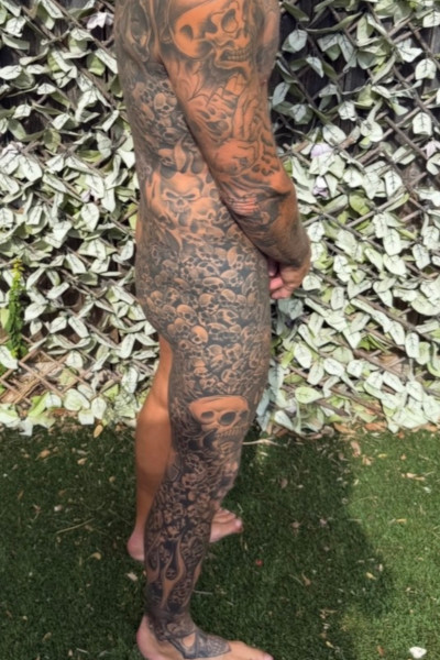 Scott from the side, naked so you can see all his tattoos