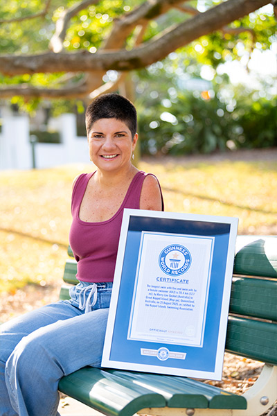 wingless-warrior-kerry-lee-gockel-with-her-gwr-certificate