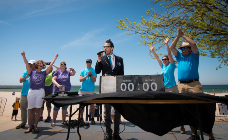 Most people making sand angels simultaneously