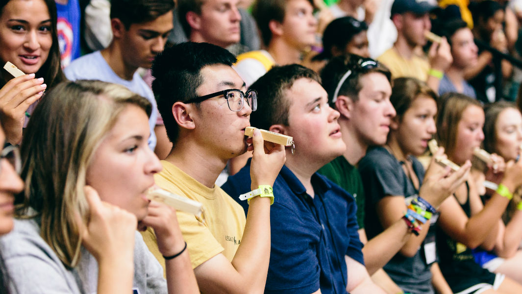 Most people blowing whistles simultaneously