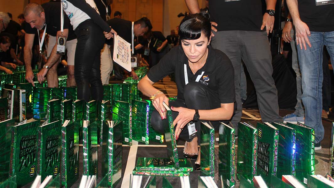 Most books toppled in a domino fashion in one hour