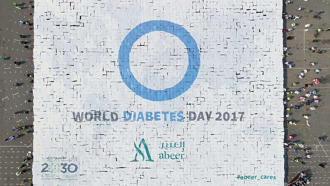 Largest picture mosaic formed by people header