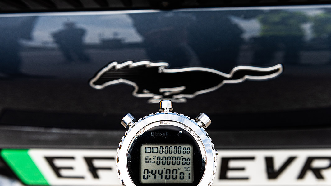 Close-up-Ford-Mach-E front-stop-watch-logo-car-plate