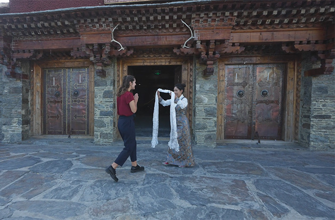 Anouk being greeted by professional sommelier Ms Yuan