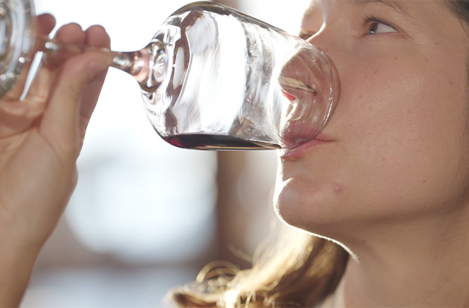Anouk tasting wine