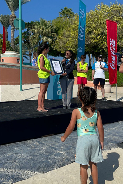 guinness world records adjudicator presents official certificate