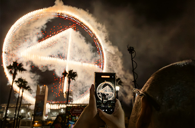 Drone show forms Fantastic Four logo with pyro drones