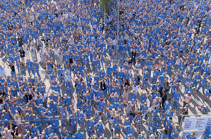 aerial view of a crowd of people wearing the same two piece pajama set