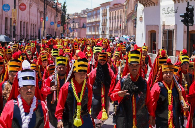 Smiling parade walkers